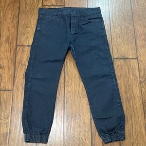 Levi's 513, 33X30 Dark Blue Joggers Dark Blue Denim Jeans with elastic Cuffs.